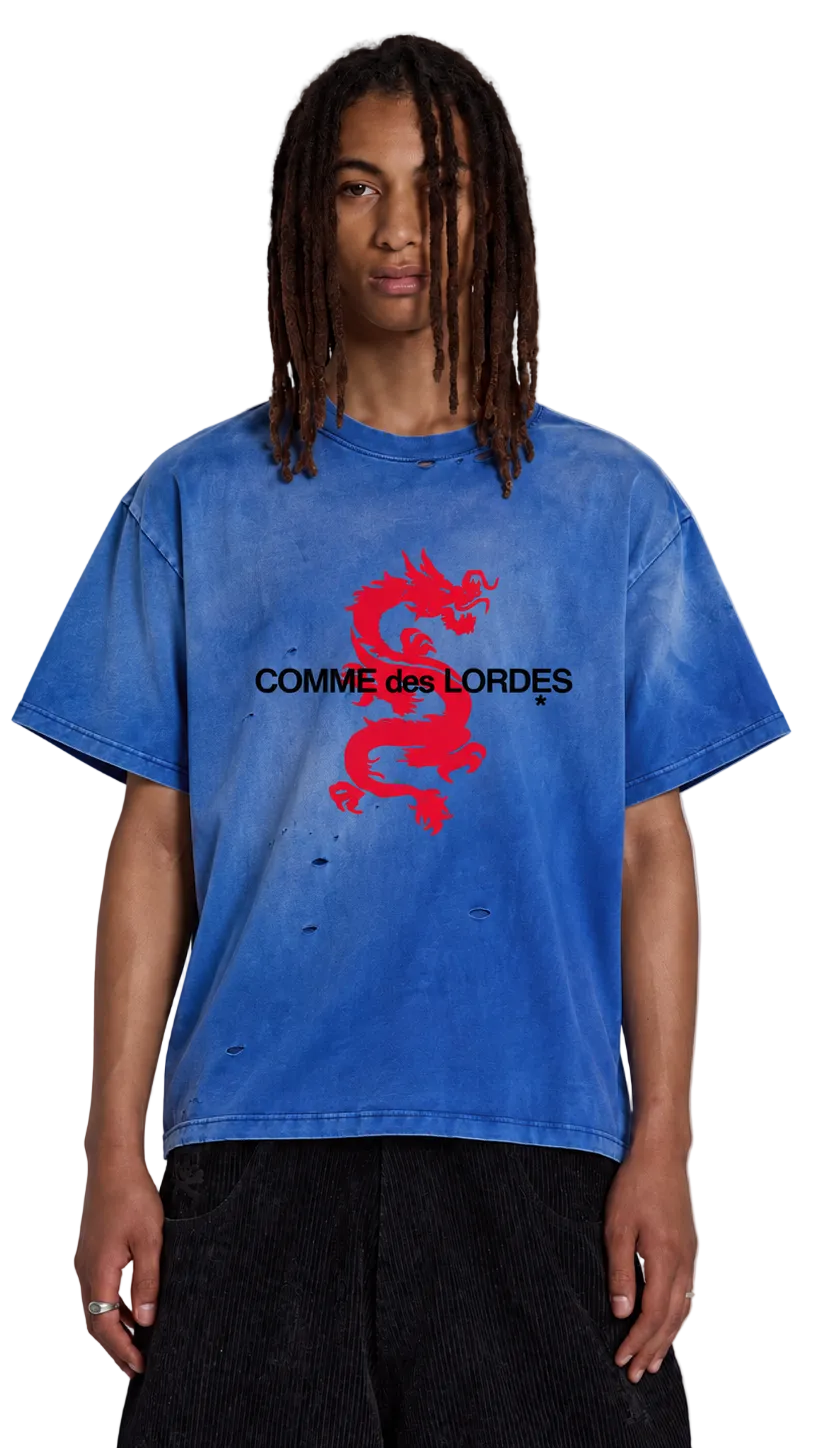 Front view of washed-blue COMME des LORDES oversized tee with red dragon graphic