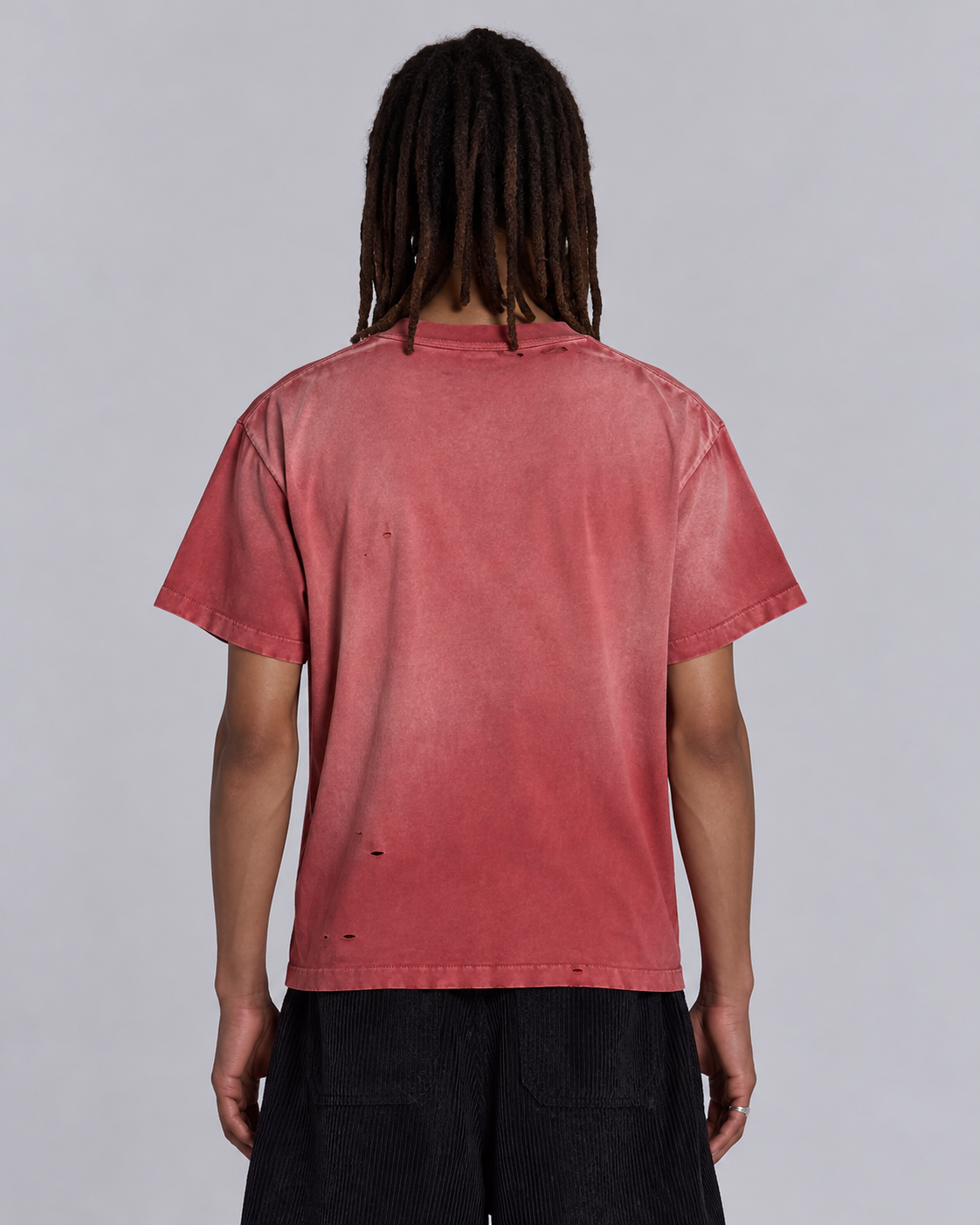 Back view of washed-red HOL oversized tee with distressed detailing